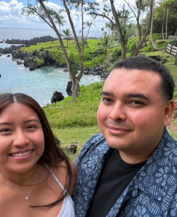 Omar and his wife at the coast